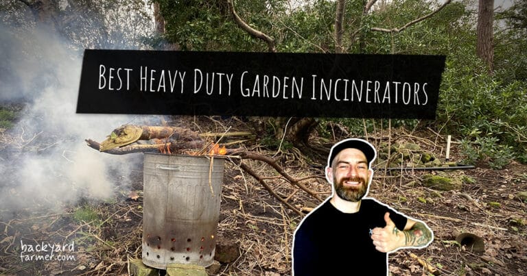Man standing next to a burning heavy duty garden incinerator in woodland, Backyard Farmer review banner